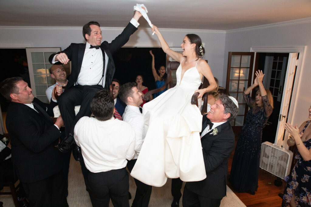 Hamptons Wedding at a private residence during the hora in the living room